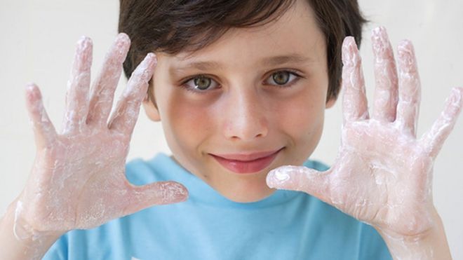 File photo of boy washing hands