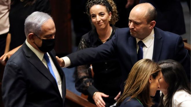 Benjamin Netanyahu and Naftali Bennett in the Knesset (13 June)
