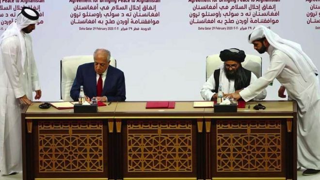 US and Taliban representatives sign an agrement