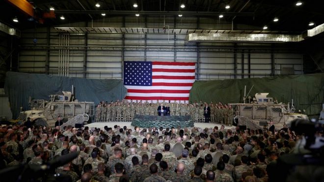 US President Donald Trump addresses US troops during an unannounced visit to Bagram air base in Afghanistan in November 2019