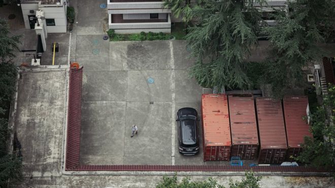 A man enters the US Consulate General in Chengdu after China announced it was revoking the license of the US Consulate General in Chengdu on 24 July 2020