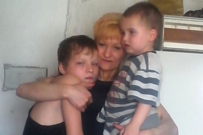 Natalya Kostseva with Stanislaw and a grandson