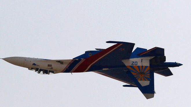 A Sukhoi Su-27 jet flies during an airshow in Iran's southern resort island of Kish on November 16, 2016.