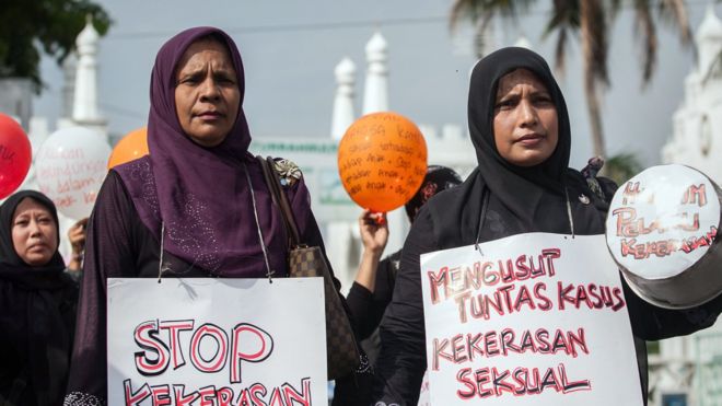 Indonesian mothers staging a protest against child sexual abuse in Banda Aceh in Aceh province, on western Sumatra island, following incidents of child sexual abuse in Banda Aceh and in Jakarta on 24 April 2014