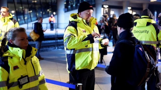 Security staff check IDs at Kastrups train station outside Copenhagen, Denmark, 04 January 2015.
