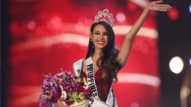Miss Philippines Catriona Gray waves after being crowned Miss Universe