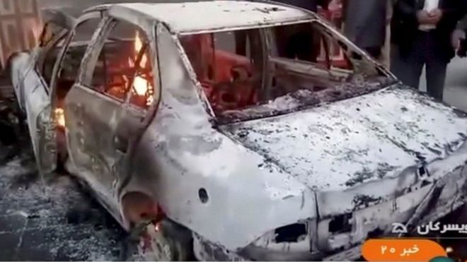 Burning car in Tuyserkan, Iran, on 31 December