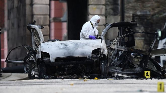 Forensic officer at the scene of the explosion