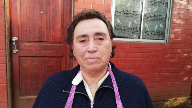 Sara Jineo, a mother whose baby was taken without her permission, outside her home in Temuco, Chile