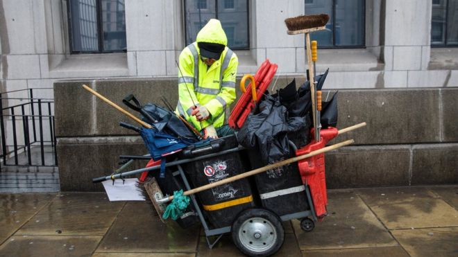 A street cleaner at London Bridge