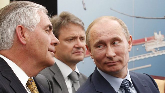 Генеральный директор Exxon Mobil Рекс Тиллерсон и президент России Владимир Путин