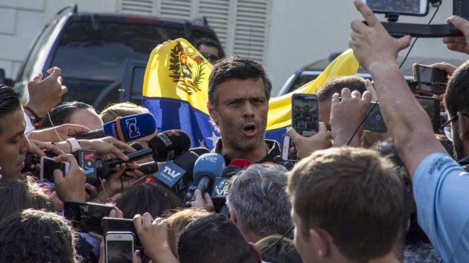 Opposition figure Leopoldo López speaking to reporters from the Spanish embassy in Caracas