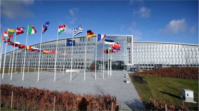 Flags outside the Nato headquarters in Brussels