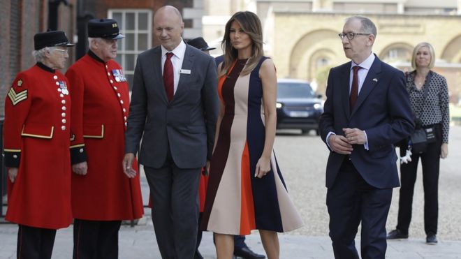 First Lady Melania Trump, is accompanied by Philip May, the husband of British Prime Minister Theresa May as she meets British military veterans known as 'Chelsea Pensioners' at Royal Hospital Chelsea on July 13, 2018 in London, England.