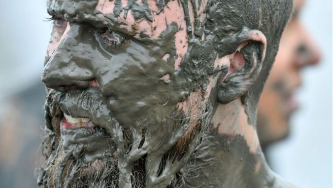 Competitors take part in the 2018 Mud Olympics in Brunsbüttel in northern Germany