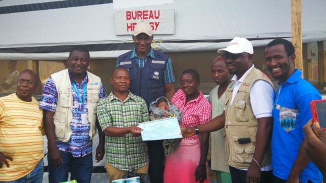 Baby Benedicte is taken home after surviving Ebola
