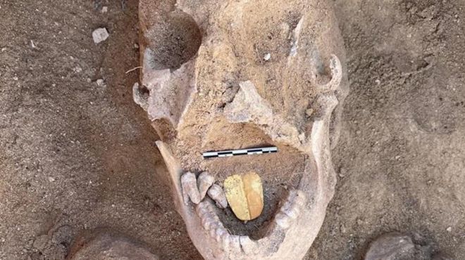 Remains of ancient Egyptian mummy with golden tongue placed inside its mouth, found at Alexandria's Taposiris Magna temple