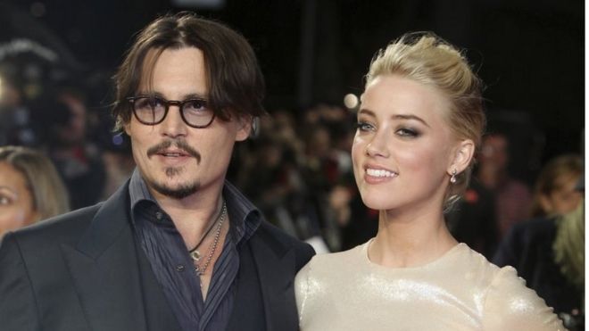 US actors Johnny Depp, left, and Amber Heard on 3 November 2011