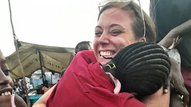Katie Meyler hugs a child