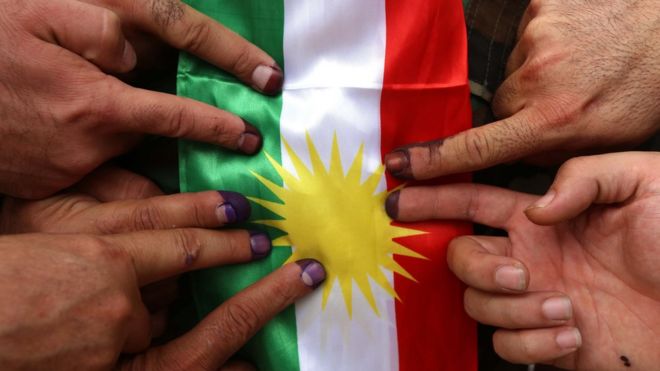 Supporters of Kurdish independence cast their vote in a referendum in Irbil, the capital of the autonomous Kurdish region of northern Iraq, 25 September 2017