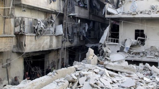 Aftermath of an air strike on a rebel-district of Aleppo, 11 March