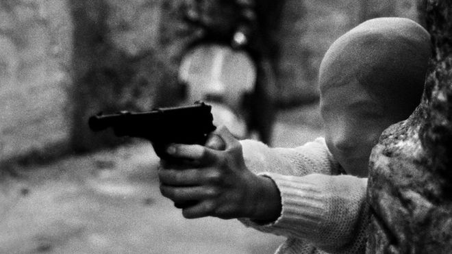 Мальчик с игрушечным пистолетом в Палермо
