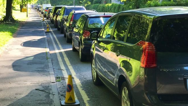 Cars queuing on Campbell Road, Stoke-on-Trent, to access Hanford tip