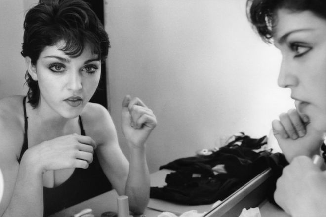 Madonna reflected in a dressing room mirror in New York in 1979