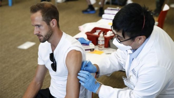 Man being vaccinated in the US