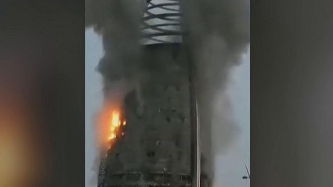 The Greater Nile Petroleum Oil Company Tower in Khartoum on fire