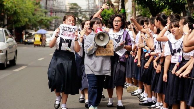 Schoolgirls protesting