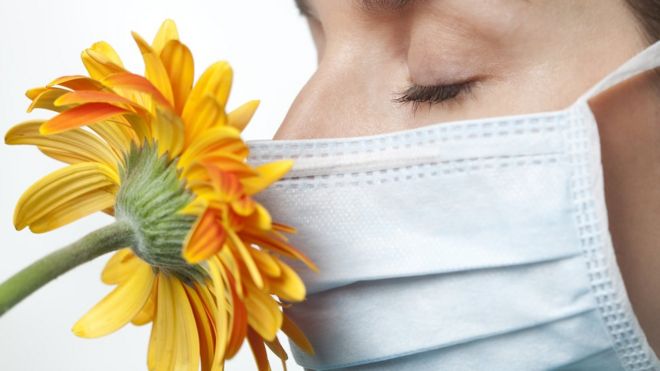 Woman wearing surgical mask