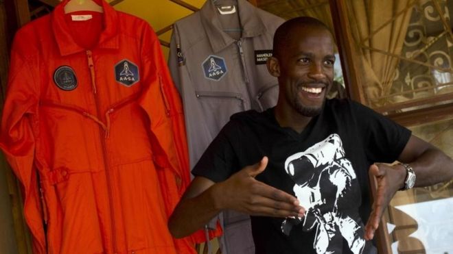 Mandla Maseko with his spacesuits in Mabopane, near Pretoria, South Africa. Photo: 9 January 2014