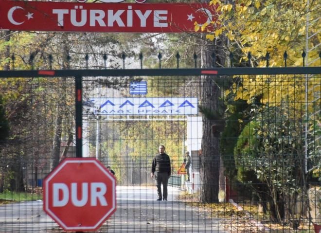 An alleged IS member stands in a no man's land at the border between Turkey and Greece near Pazarkule, on 11 November 2019