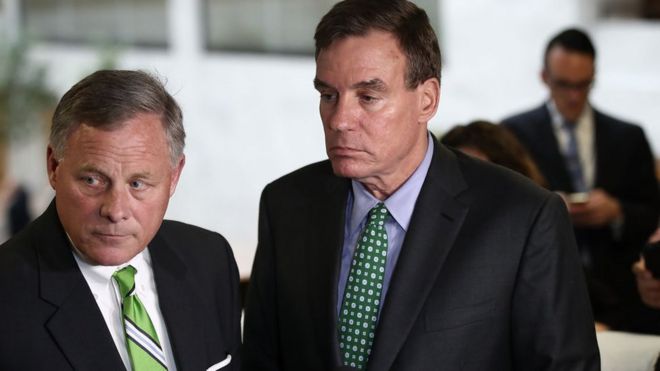 Сенаторы Барр (слева) и Уорнер говорят, что они выпустят больше повесток против уволенного советника по национальной безопасности Майкла Флинна