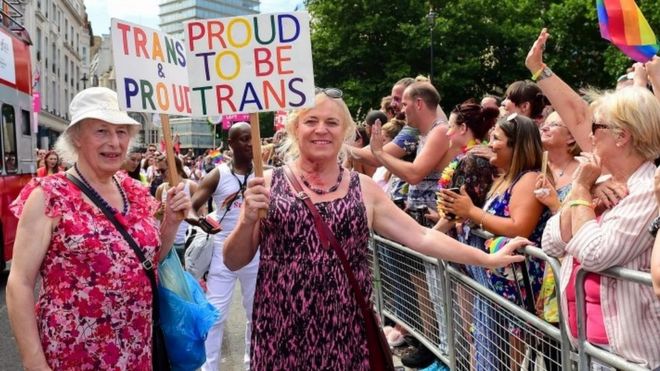 Transgendered pensioner Margaret Pepper (formerly Maurice), 73 (L) holds a placard "trans and Proud" as she takes part in London Pride parade in London, Britain, 08 July 2017.