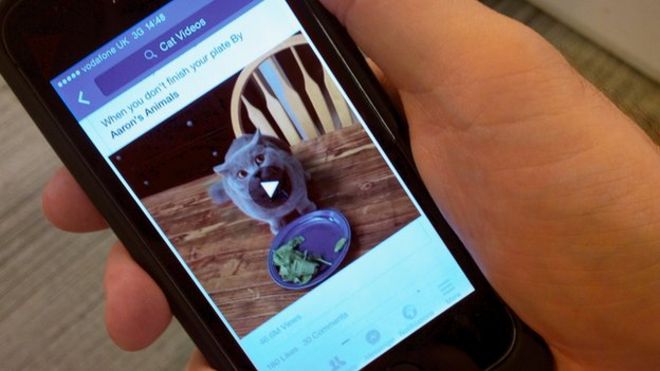 Facebook To Share Advertising Revenue With Video!    Creators Bbc News - a smartphone displaying facebook video