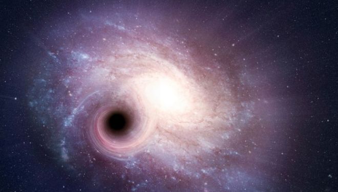 (ภาพจากฝีมือศิลปิน) มีหลุมดำอยู่นับหมื่นที่บริเวณใกล้ศูนย์กลางของกาแล็กซีทางช้างเผือก