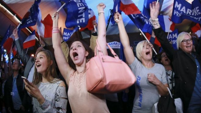 Supporters of French presidential candidate Marine Le Pen celebrate