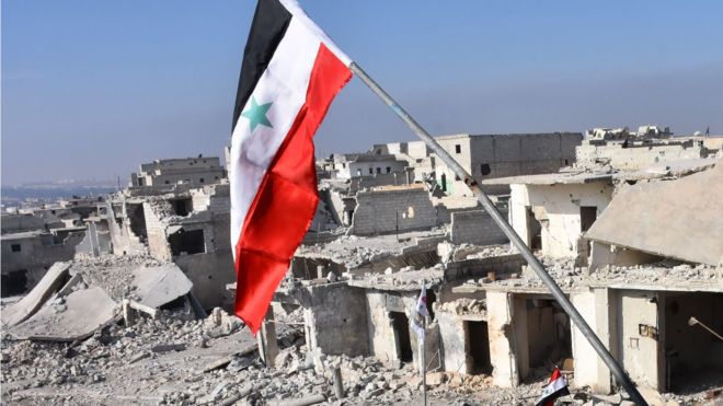 العلم السوري يرفع في حي شيخ سعيد بحلب