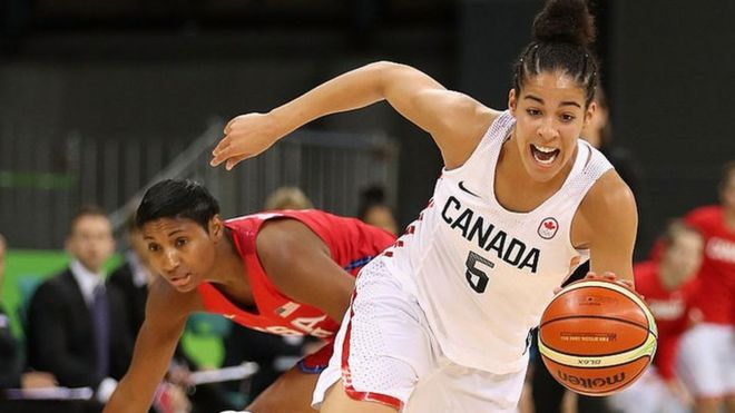 Kia Nurse #5 of Canada controls the ball past Angel Mccoughtry #8 of United States during the women's basketball game on Day 7 of the Rio 2016 Olympic Games