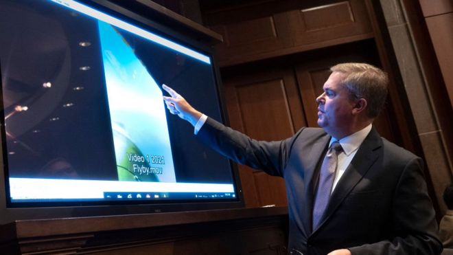 US Deputy Director of Naval Intelligence Scott Bray explains a video of an unidentified aerial phenomena