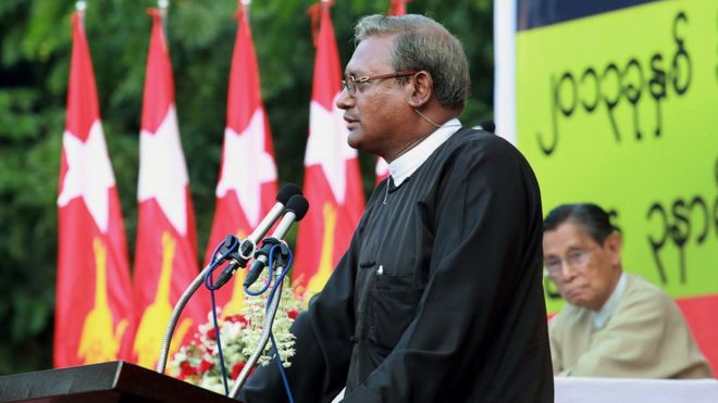 U Ko Ni delivering a public address on amending Myanmar"s 2008 constitution.