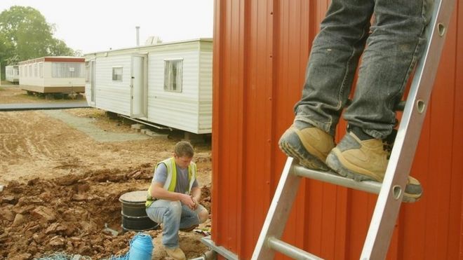 builder on ladder