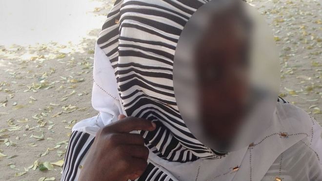 Boko Haram wife with child