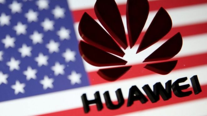 US flag and Huawei logo
