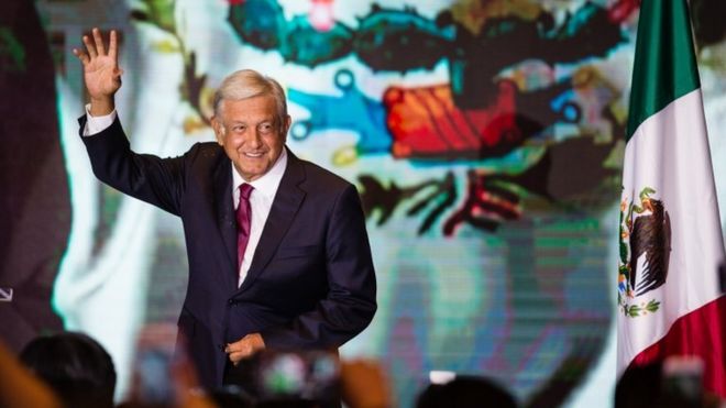 Andres Manuel Lopez Obrador waves to supporters in Mexico City 1 July 2018