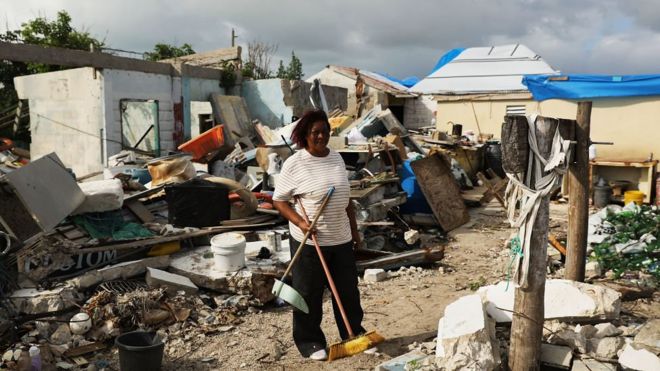 Flo Webber stands amongst the debris of her home on the nearly destroyed island of Barbuda which was nearly leveled when Hurricane Irma made landfall with 185mph winds.