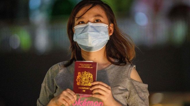 A woman in Hong Kong with her British National Overseas passport