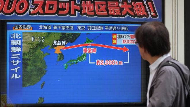 A man watches news about North Korean missile launch on Japanese TV